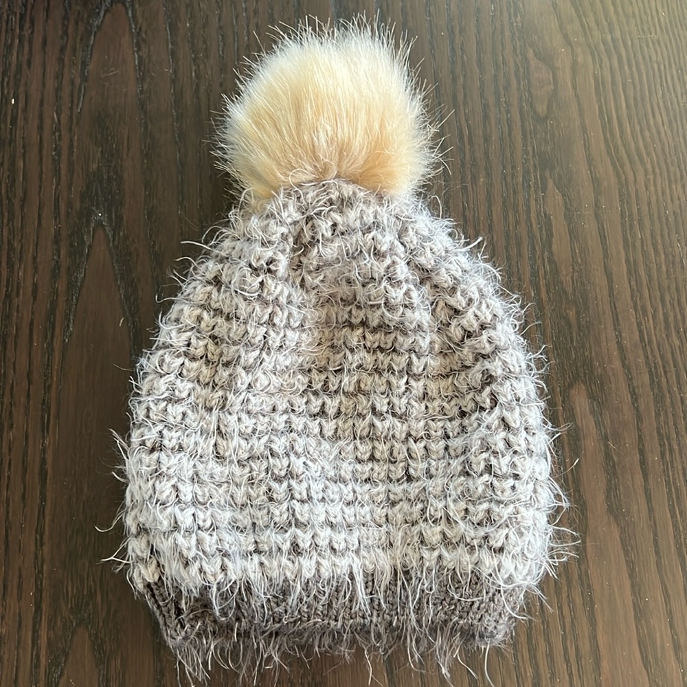 Knit hat with pom pom